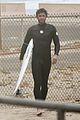 liam hemsworth bares hot bod while stripping out of wetsuit 33