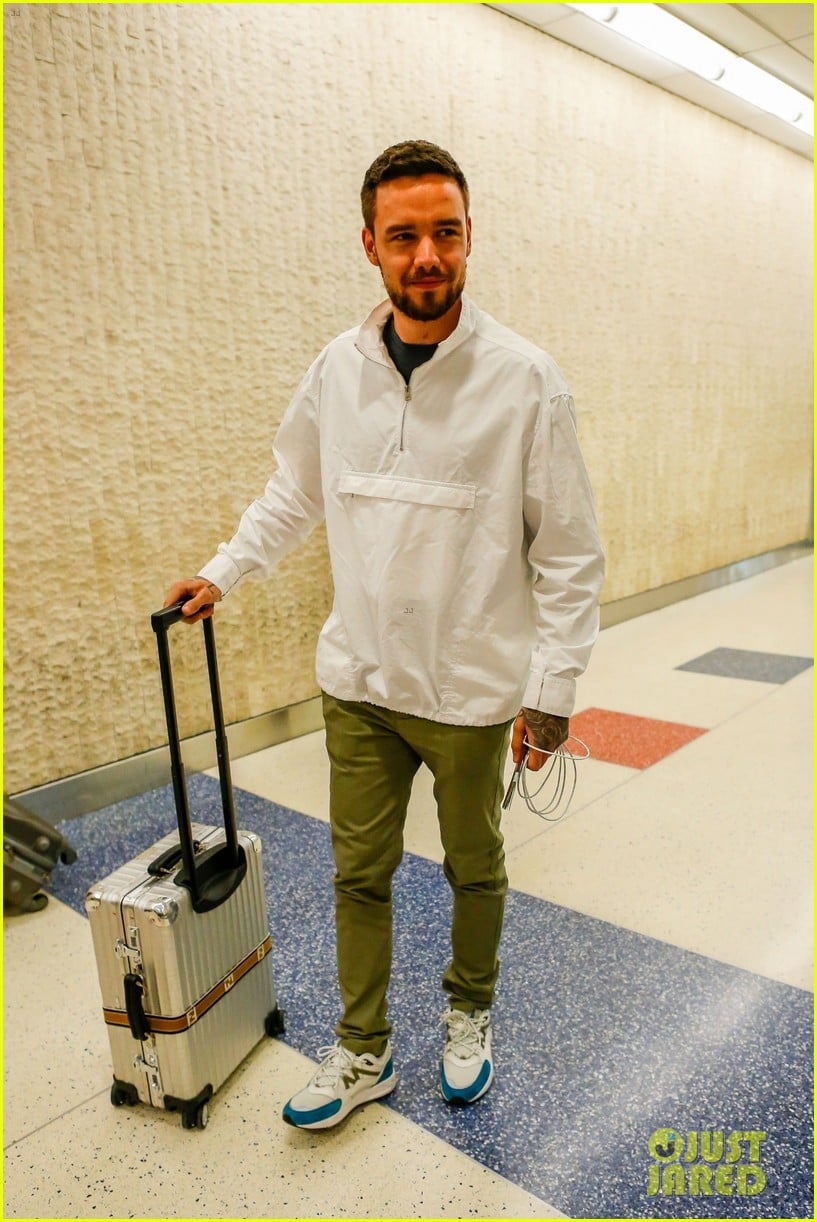 liam payne is all smiles while touching down at jfk airport 02