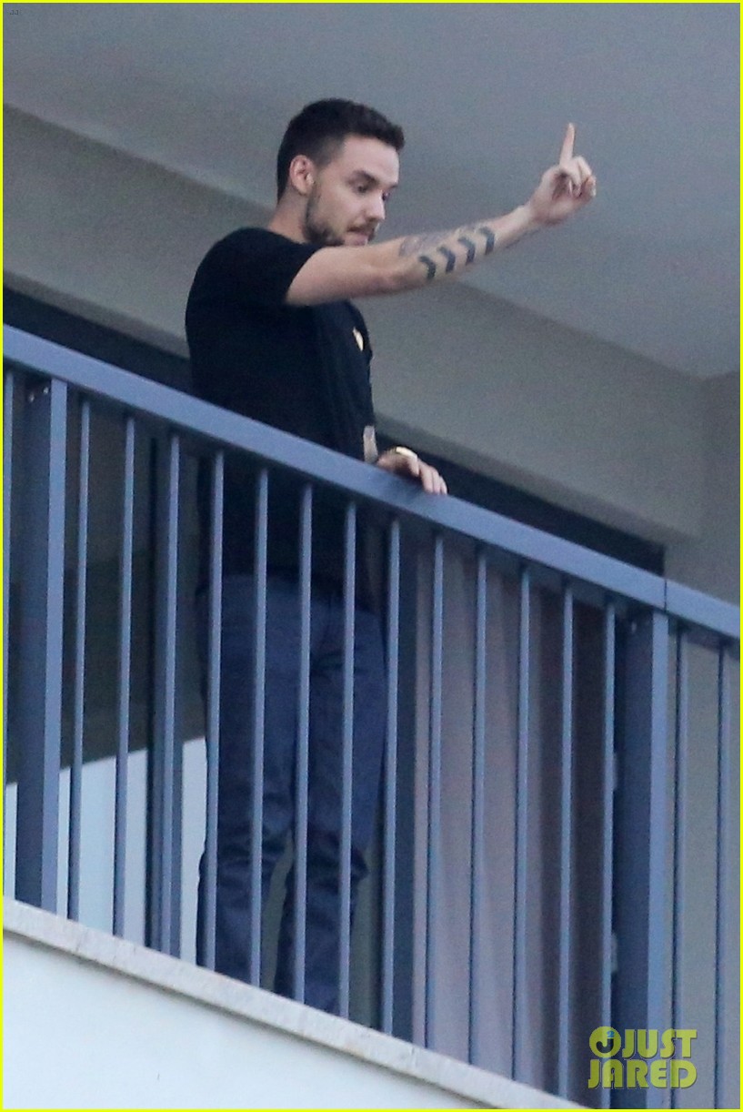 liam payne performs one directions little things from hotel balcony 04