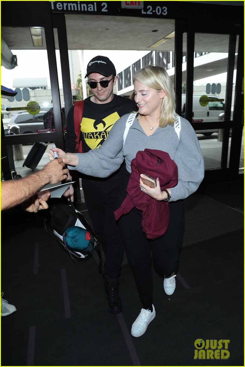 meghan trainor shows off her engagement ring from daryl sabara at lax 05