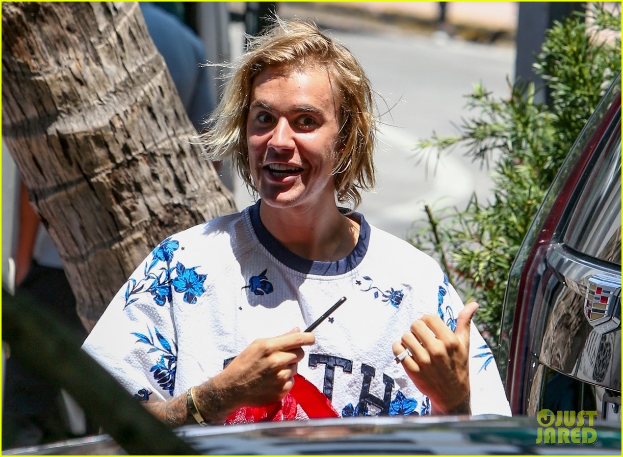 justin bieber shows off tattooed torso on vacation with hailey baldwin 24