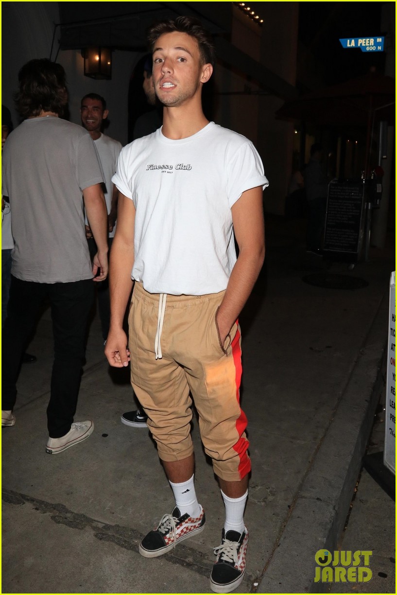 cameron dallas has some fun with phtographers at dinner 03