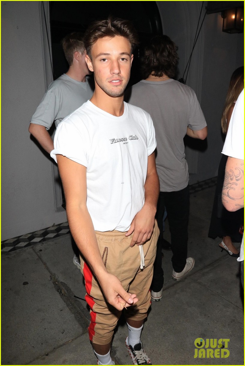 cameron dallas has some fun with phtographers at dinner 05