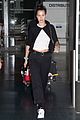 bella hadid dons black and white ensemble while touching down in paris 06