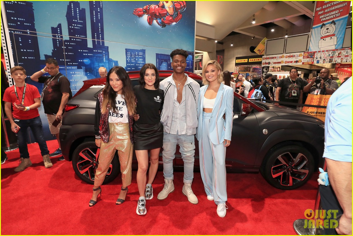 olivia holt and aubrey joseph strike a pose during comic con day 2 23