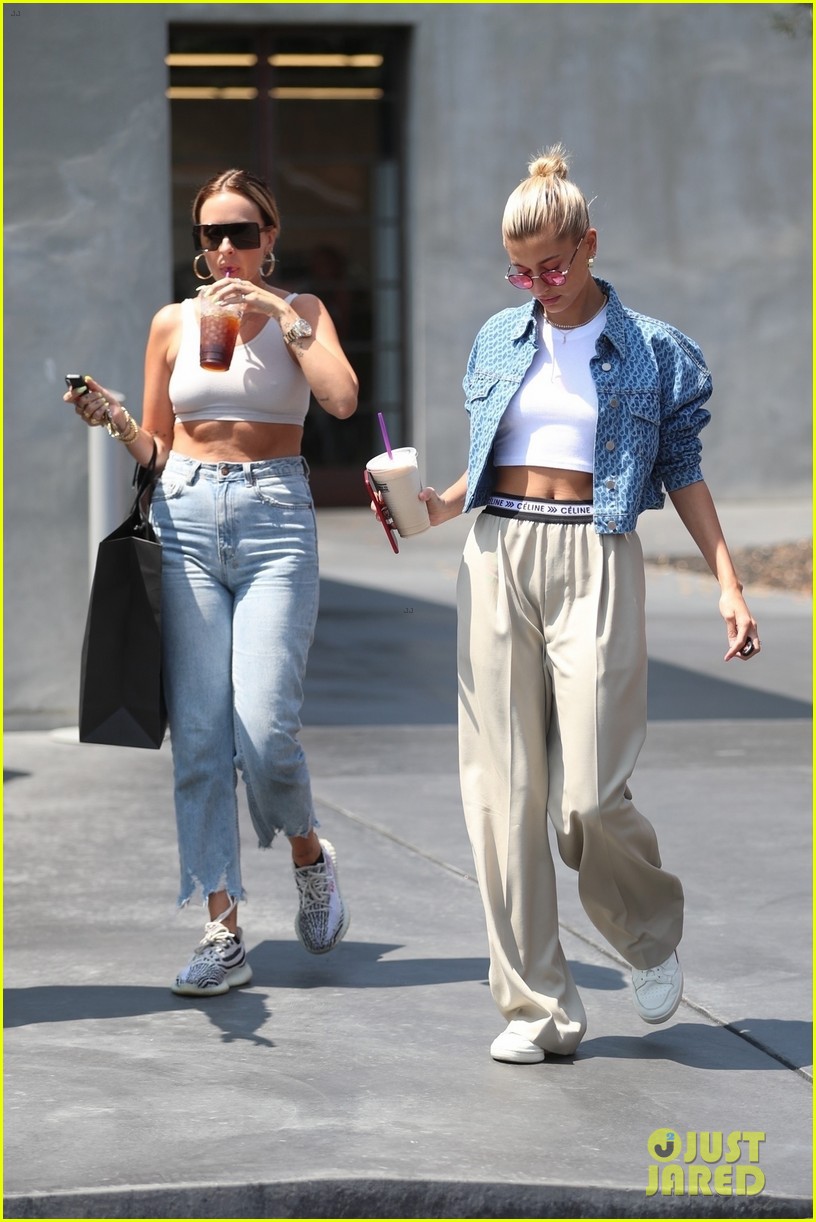 hailey baldwin sports crop top and oversized khakis while out in beverly hills 04