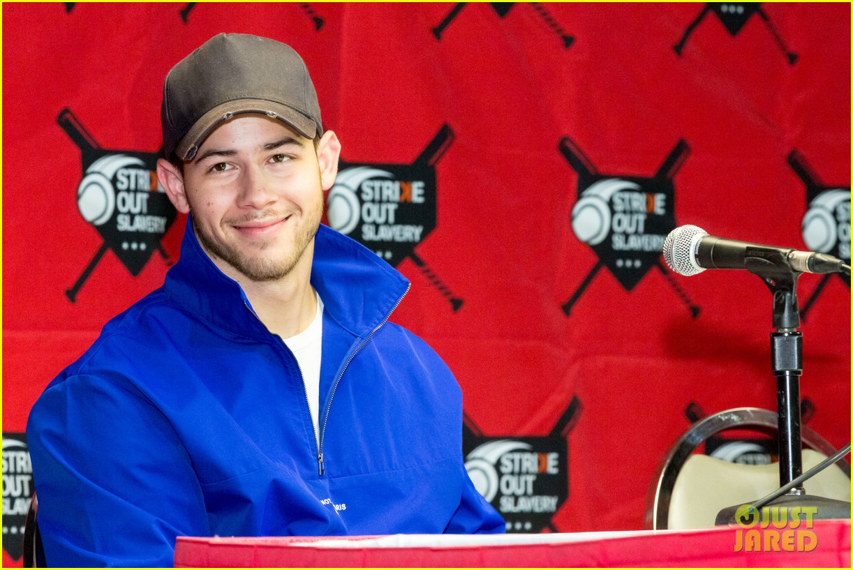 nick jonas helps strike out slavery at press conference ahead of concert 02