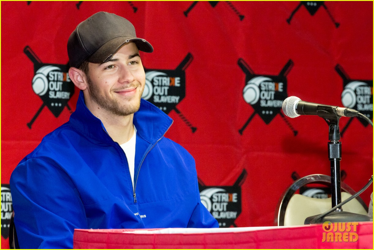 nick jonas helps strike out slavery at press conference ahead of concert 05