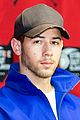 nick jonas helps strike out slavery at press conference ahead of concert 01