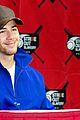 nick jonas helps strike out slavery at press conference ahead of concert 05