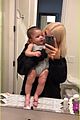 kylie jenner cuddles up to 6 month old stormi in precious snaps 03