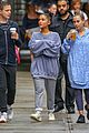 ariana grande friends get drenched rain storm 27