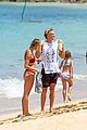 cody simpson hits the beach with girlfriend clair wuestenberg 28