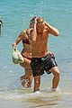 cody simpson hits the beach with girlfriend clair wuestenberg 52