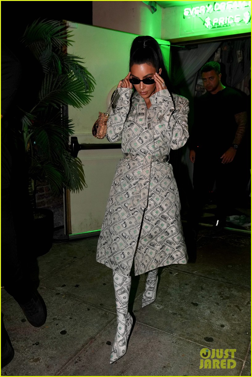kim kardashian wears dollar bill covered coat and boots while out with kylie jenner23.
