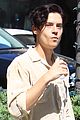 cole sprouse snaps a pic with a fan while running errands in la 03