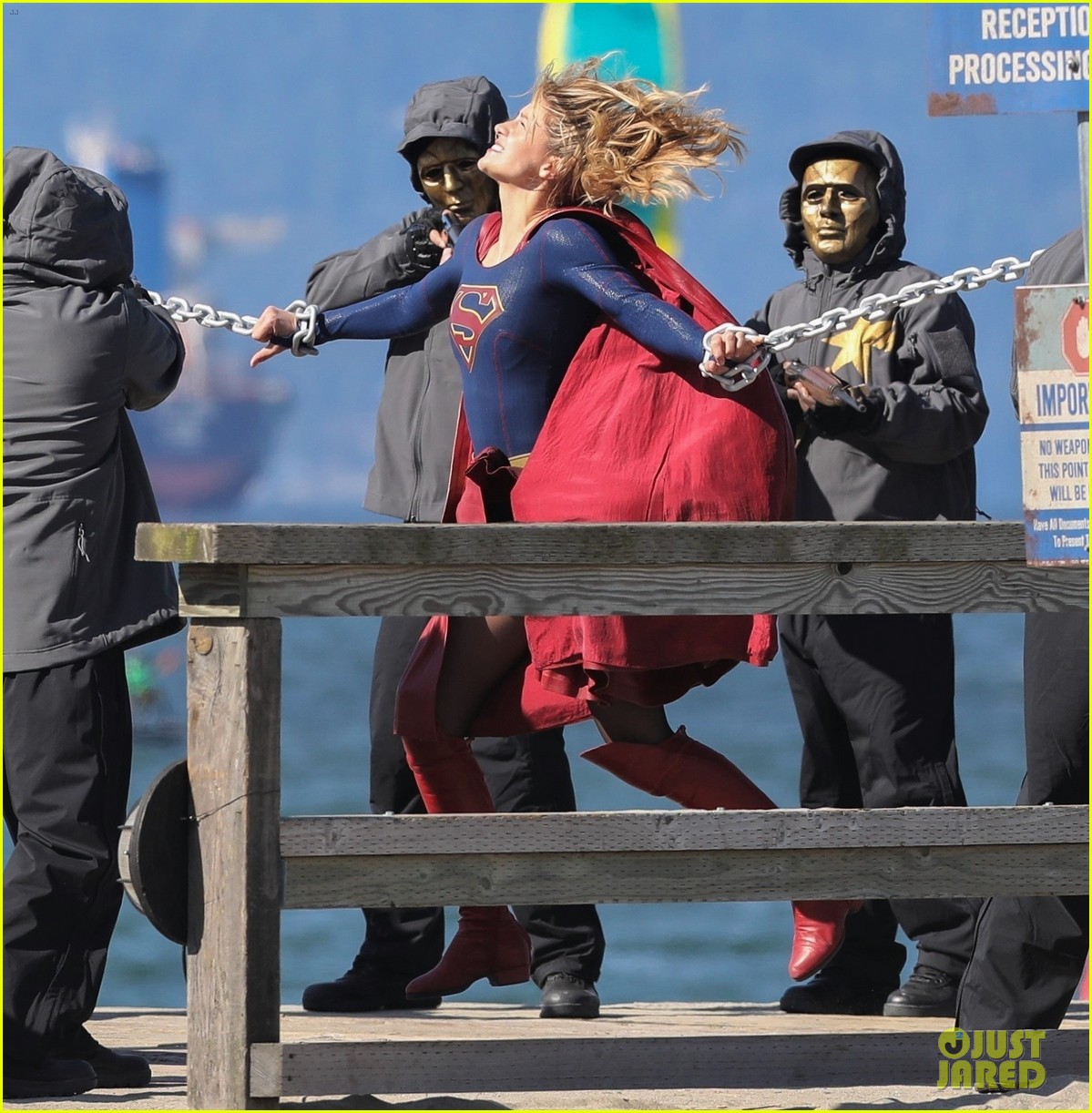 melissa benoist films intense supergirl scene with masked men 01
