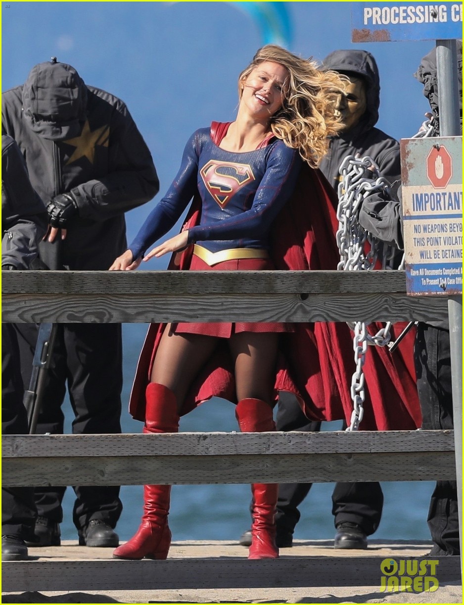 melissa benoist films intense supergirl scene with masked men 02