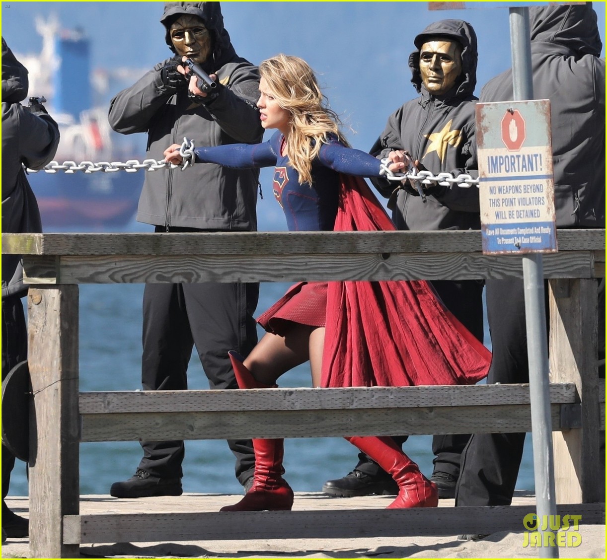 melissa benoist films intense supergirl scene with masked men 04