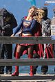 melissa benoist films intense supergirl scene with masked men 02