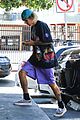 justin bieber poses with two dogs in a stroller before soccer game05