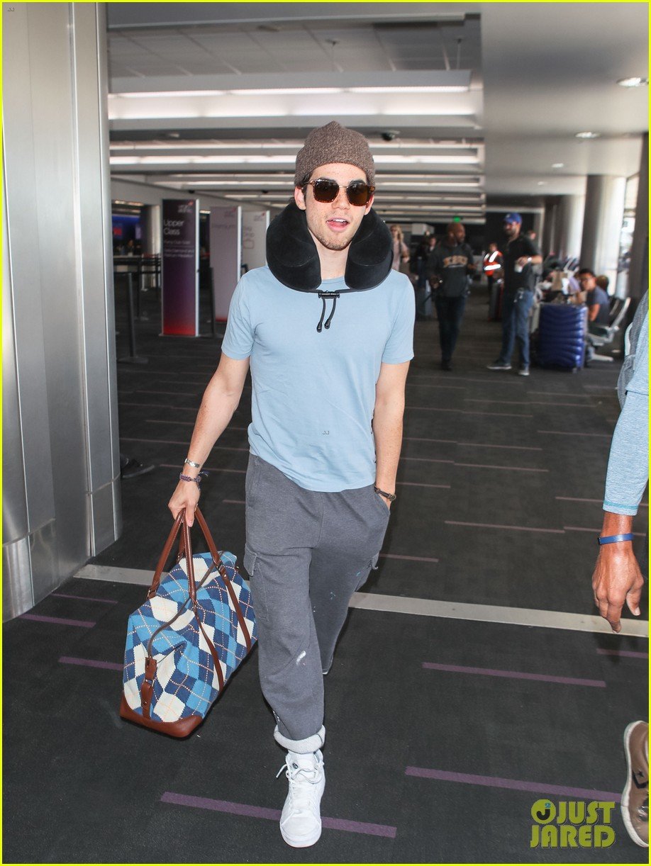 cameron boyce is all smiles while catching his flight out of lax04