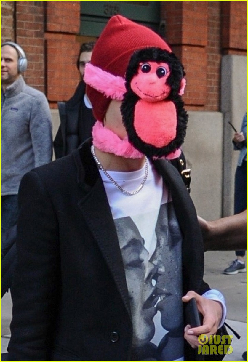 cara delevingne makes ashley benson laugh while stepping out with stuffed monkey on her face07