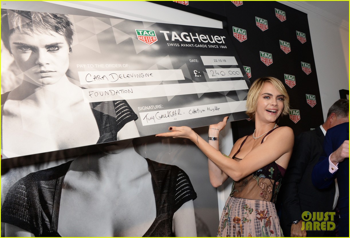 cara delevingne stuns in sheer top at tag heuer auction of her campaign photos03