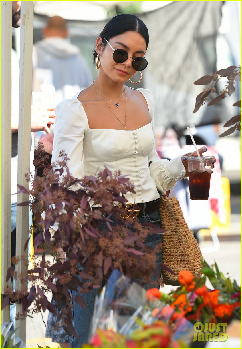 Vanessa Hudgens Pairs Halloween T Shirt With Spiderweb Tights While Visiting A Friend Photo