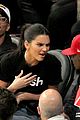 kendall jenner makes an outfit change during lakers rockets basketball game08