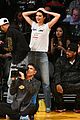 kendall jenner makes an outfit change during lakers rockets basketball game19