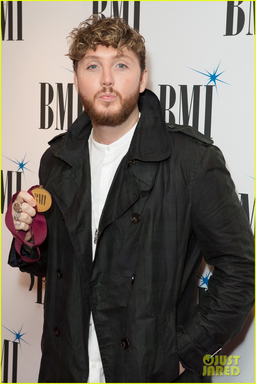 liam payne suits up while attending bmi awards in london05