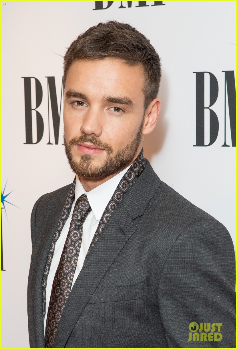 liam payne suits up while attending bmi awards in london10