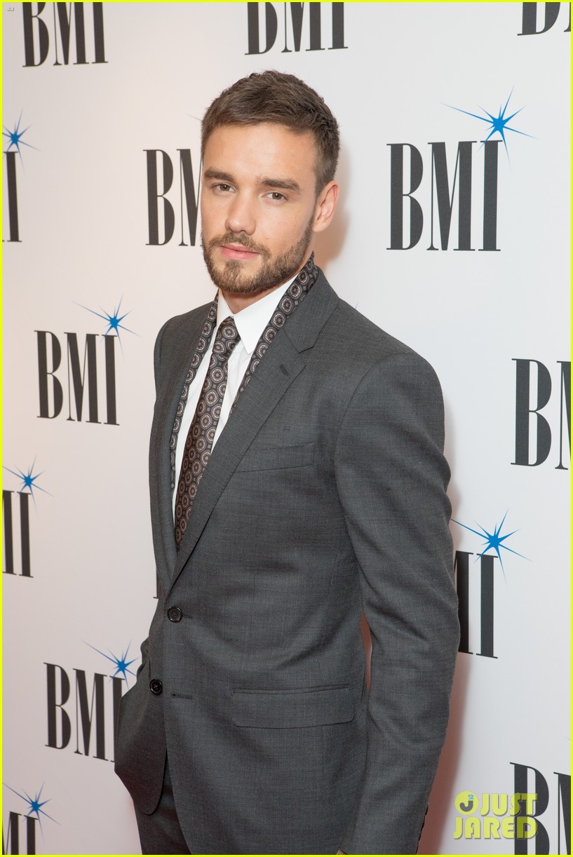 liam payne suits up while attending bmi awards in london11