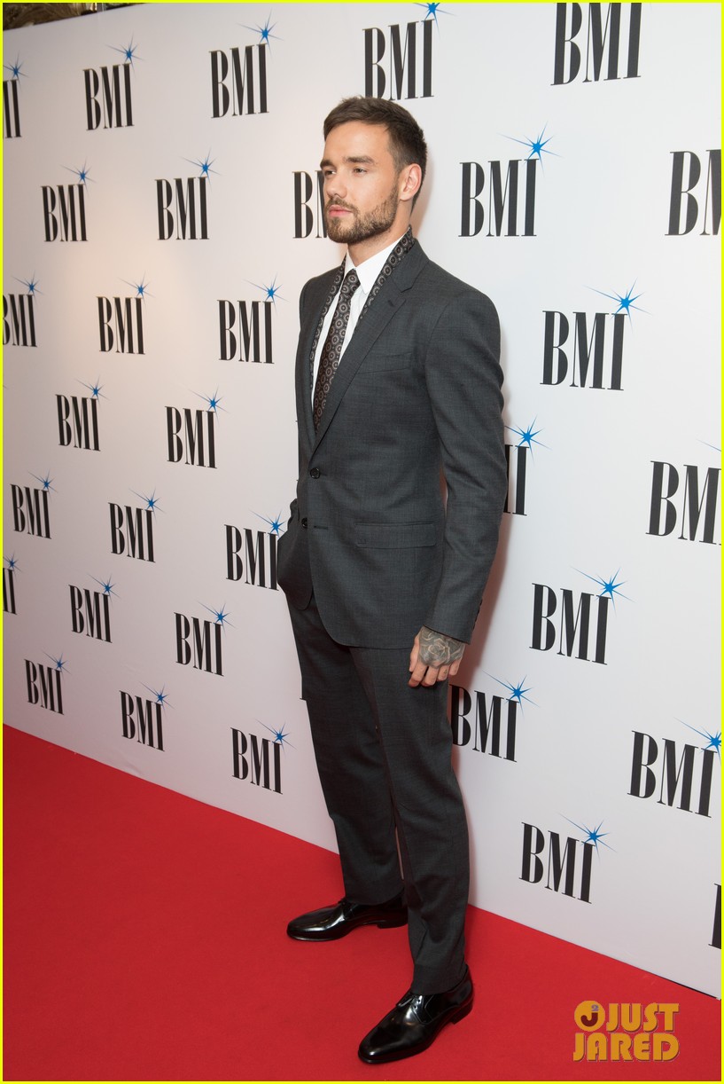liam payne suits up while attending bmi awards in london14