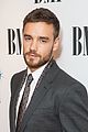 liam payne suits up while attending bmi awards in london10