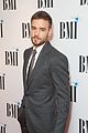 liam payne suits up while attending bmi awards in london11