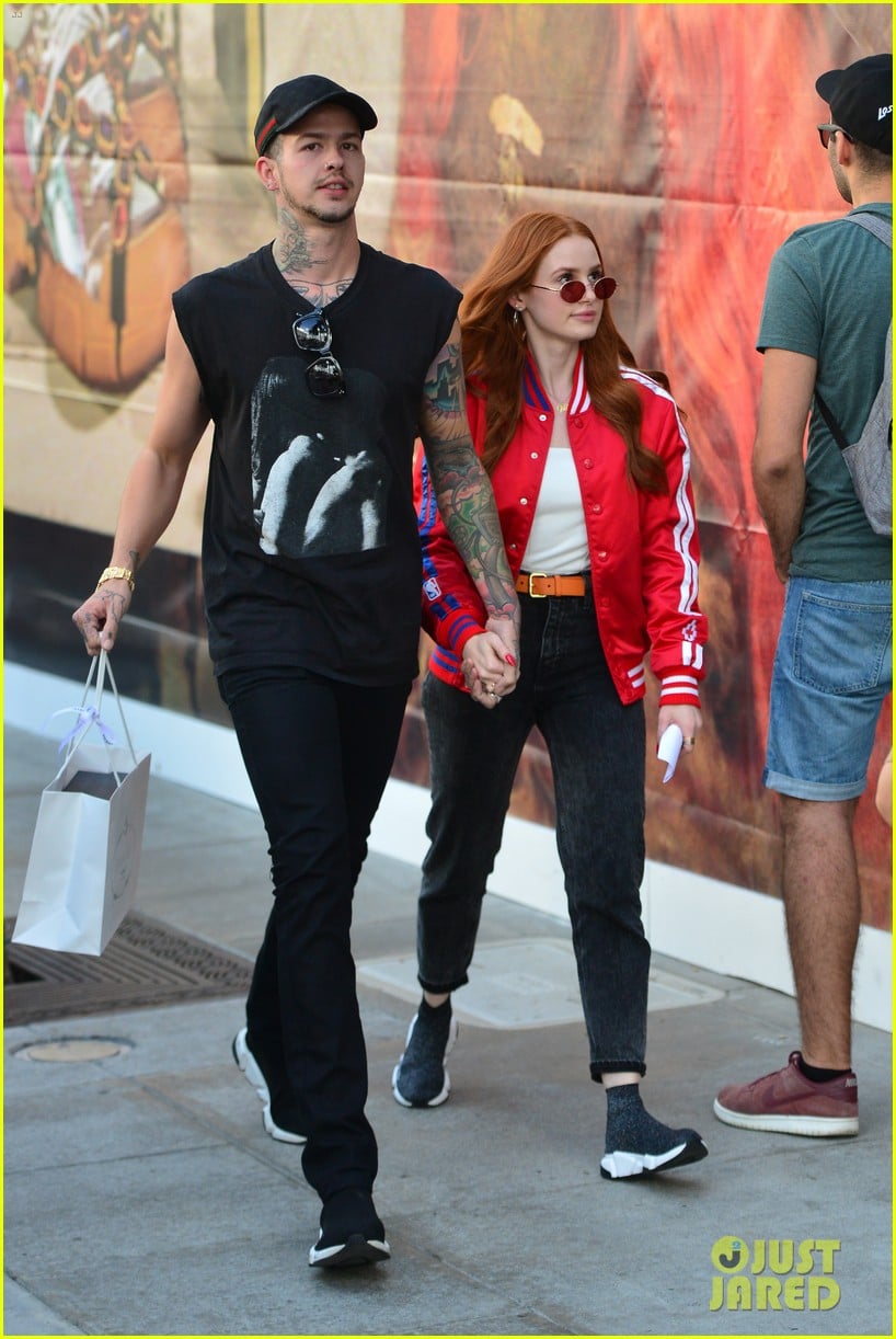 madelaine petsch gets piggyback ride from boyfriend travis mills while out shopping02