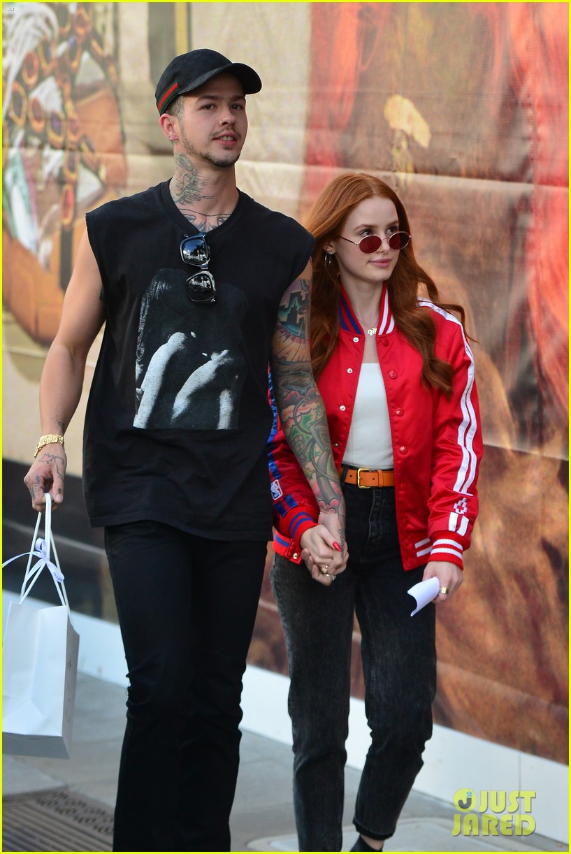 madelaine petsch gets piggyback ride from boyfriend travis mills while out shopping09