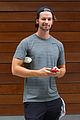 patrick schwarzenegger shows off his muscles the gym03