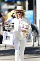 ashley tisdale wears all white while running errands with her pup 01