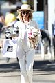 ashley tisdale wears all white while running errands with her pup 05