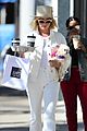 ashley tisdale wears all white while running errands with her pup 14