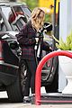 ashley benson makes pit stop to fuel her suv 05
