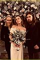 miley cyrus poses with parents billy ray tish cyrus at her wedding 02