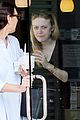 dakota fanning dons black dress for froyo date with her mom 01