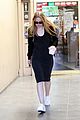 dakota fanning dons black dress for froyo date with her mom 03