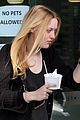 dakota fanning dons black dress for froyo date with her mom 04