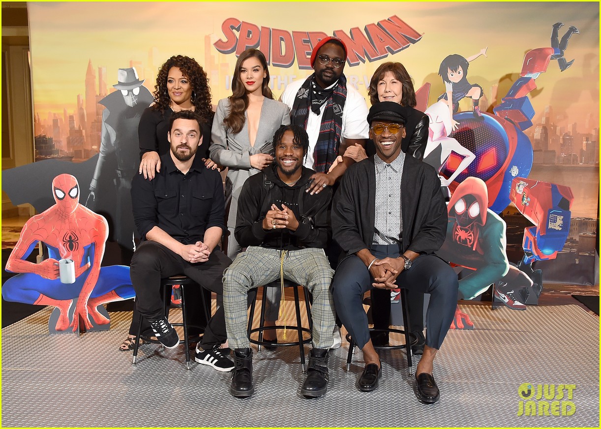 hailee steinfeld dons plunging grey pantsuit for spider man spider verse photo call 11