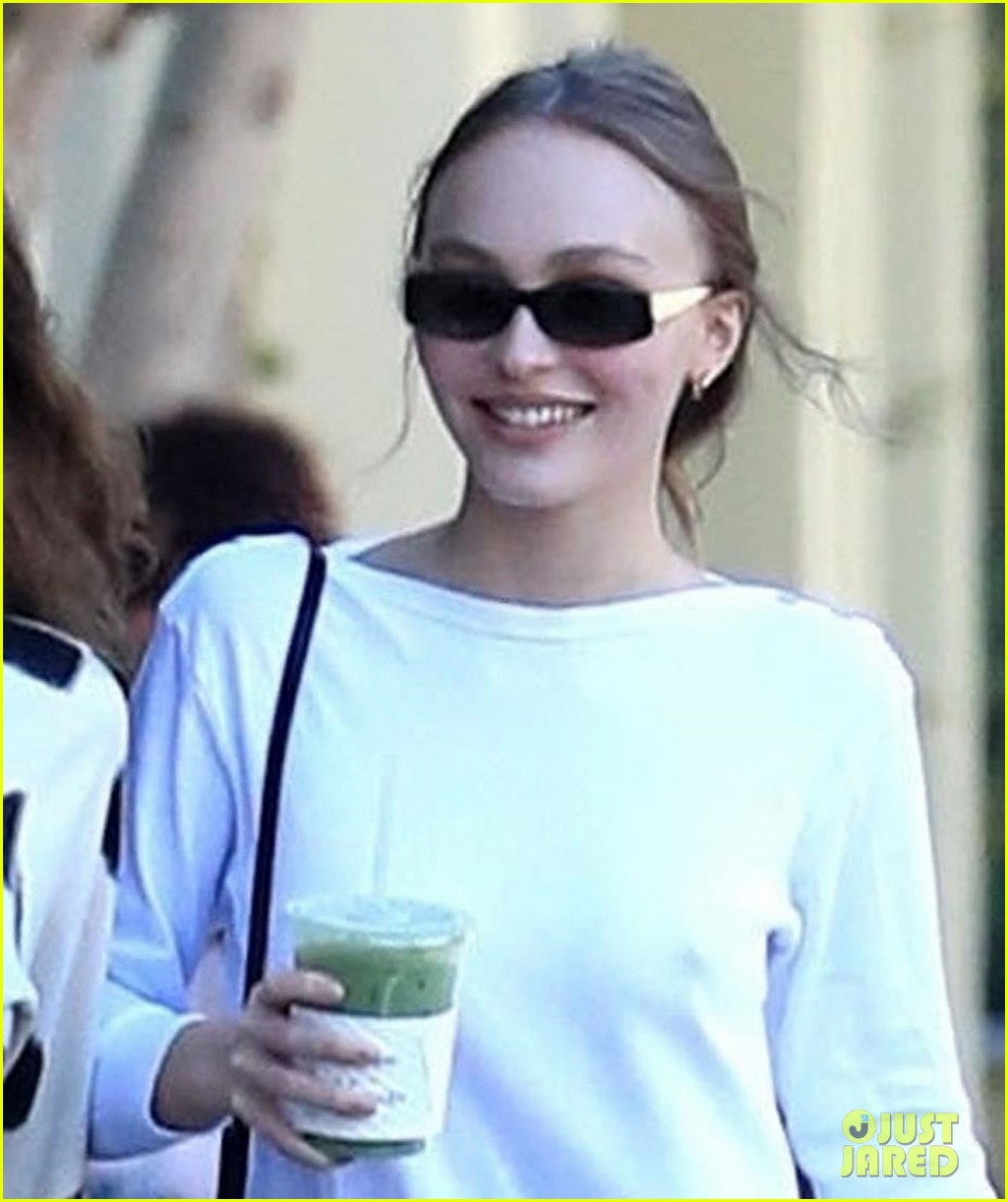 lily rose depp keeps it casual while picking up a green drink 04